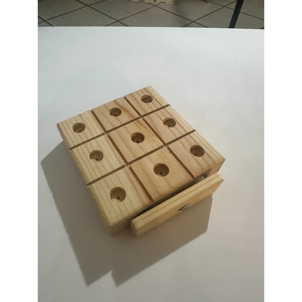 Wooden tic tac toe game with marbles